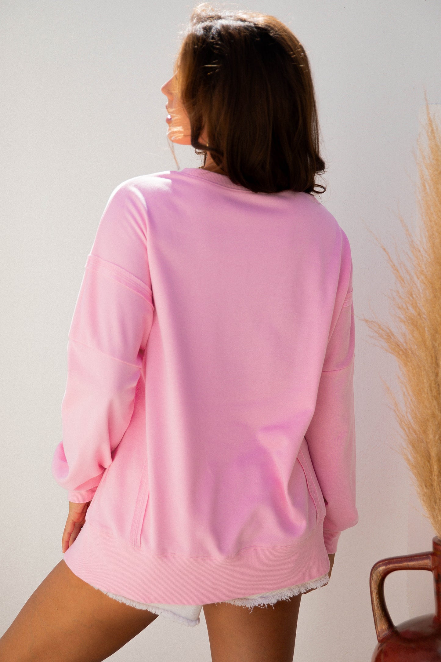 Pink Bow Sequin XOXO Letter Graphic Exposed Seam Baggy Sweatshirt