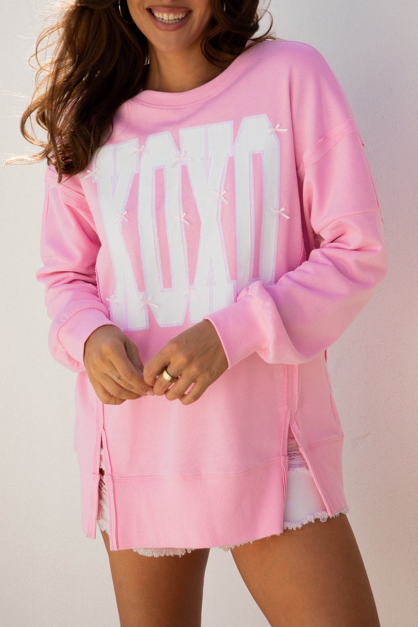 Pink Bow Sequin XOXO Letter Graphic Exposed Seam Baggy Sweatshirt